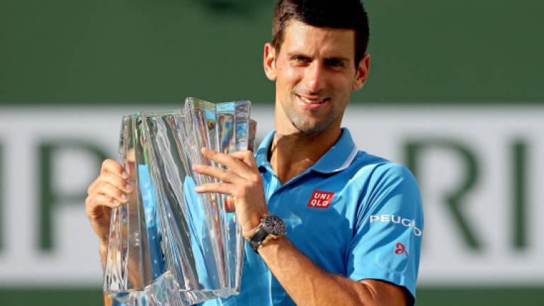 Djokovic beats Federer to defend Indian Wells title