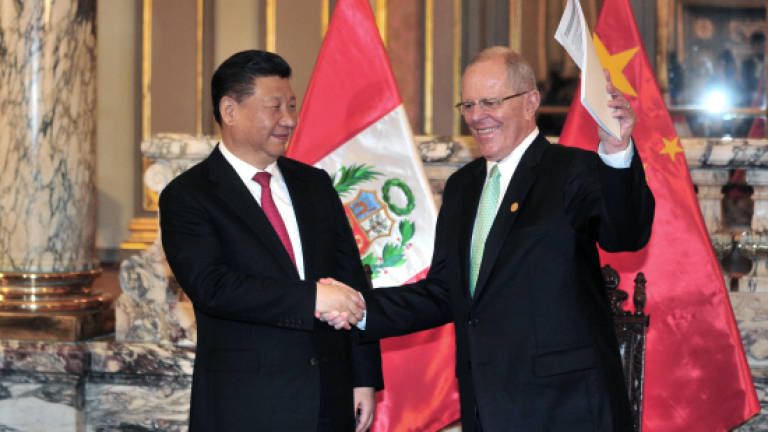 China signs new trade deals with Peru