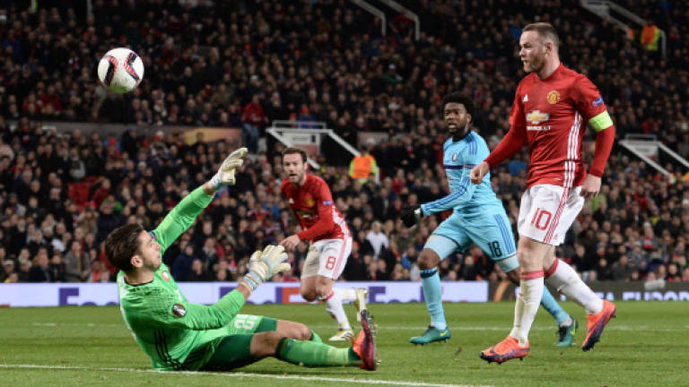 Record man Rooney gives Man Utd Europa lift