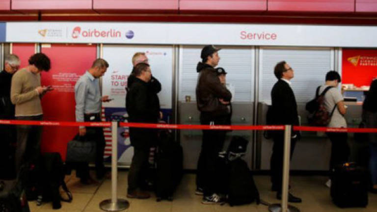 Air Berlin scraps more flights as pilots call in sick