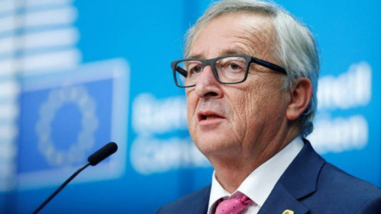 Italy needs to work harder, be less corrupt: Juncker