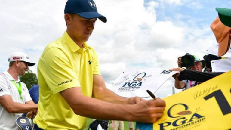 Spieth, McIlroy favoured at soggy PGA Championship