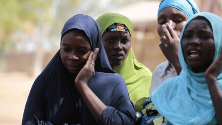 More than 90 Nigerian schoolgirls missing after Boko Haram attack, say sources