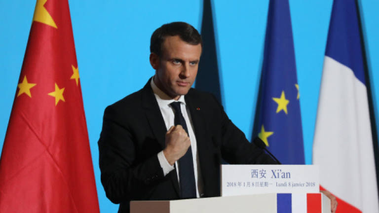 Macron begins China state visit at Silk Road gateway