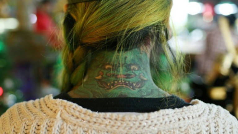 Tattooed and proud: Chinese women peel away stigmas