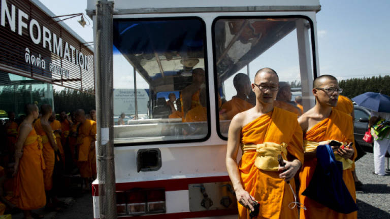 Media-savvy Thai monks wage PR war to defend scandal-hit abbot