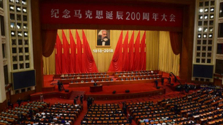 China will continue to 'hold high the great banner of Marxism', Xi says