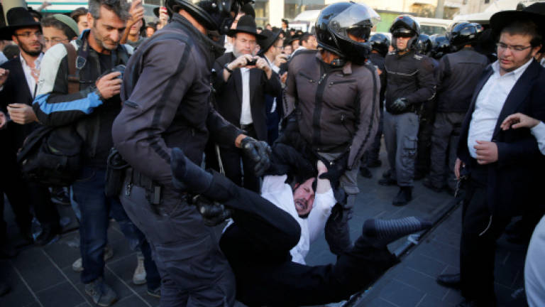 Israeli police arrest 120 ultra-Orthodox Jews protesting army draft