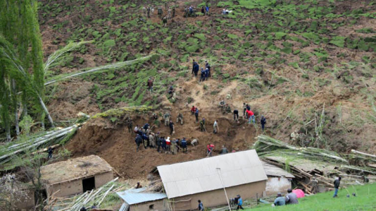24 dead as Kyrgyz landslide engulfs village homes