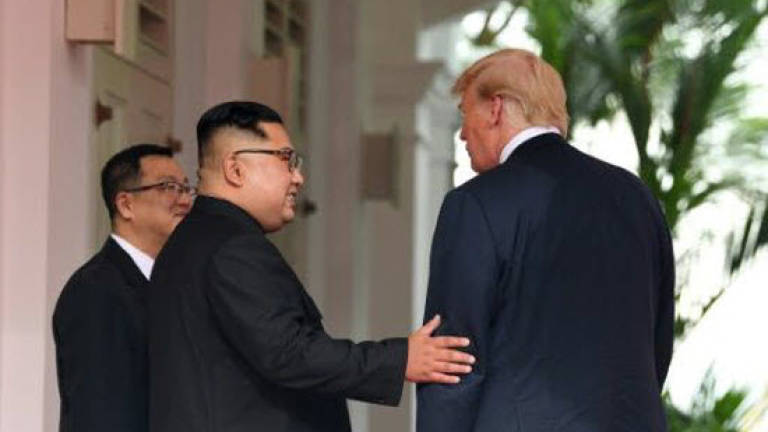 Back-slapping Trump summit legitimises Kim, say critics