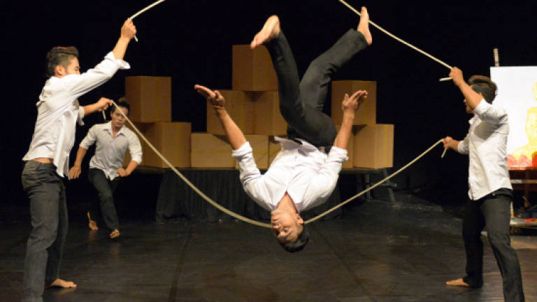 Circus troupe captures Cambodia's contorted history