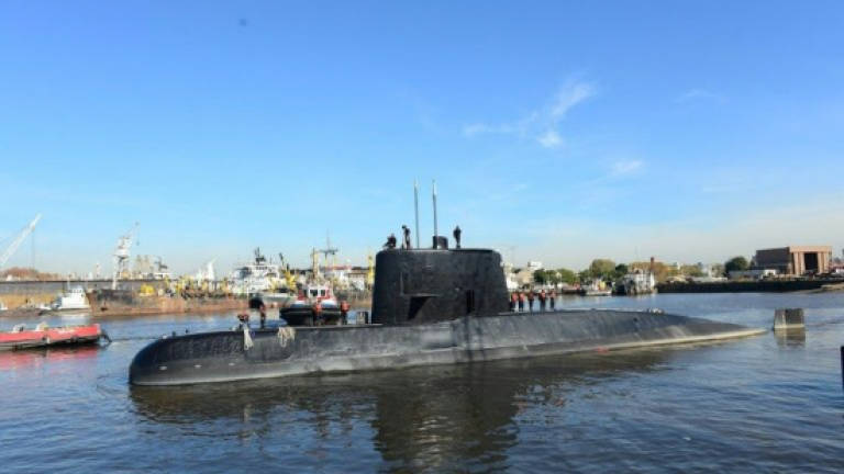 Argentina's search for missing sub hampered by bad weather