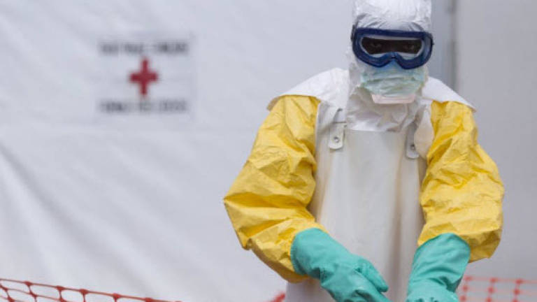 Sierra Leone berates Ebola quarantine escapees as cases surge