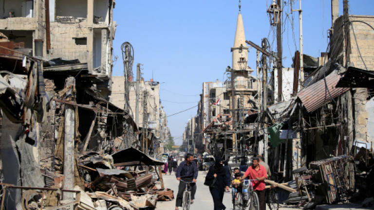 Syria regime retakes new region near Damascus: state media