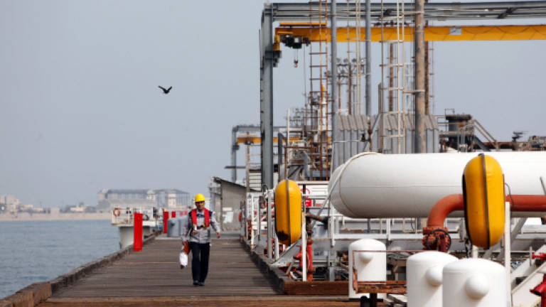 Total signs major Iran gas deal, defying US pressure