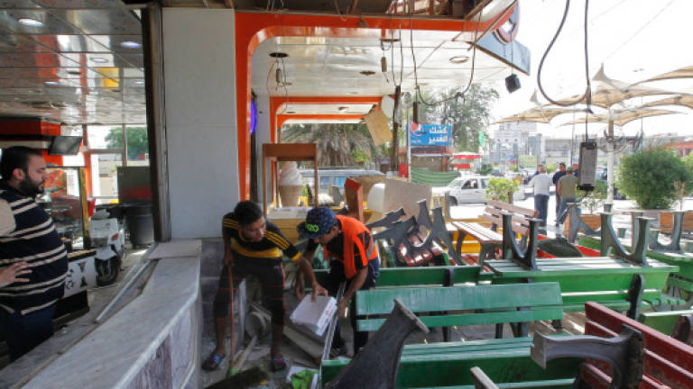 Suicide bomber kills 16 at Baghdad ice cream shop