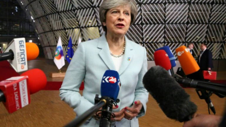 Britain's May pushes EU on Brexit deal