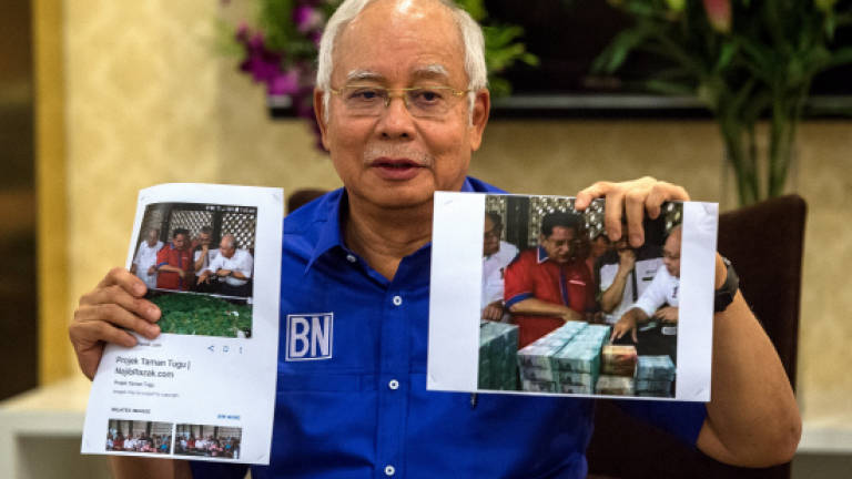 Najib cautions people over opposition 'tsunami' of defamation tactics
