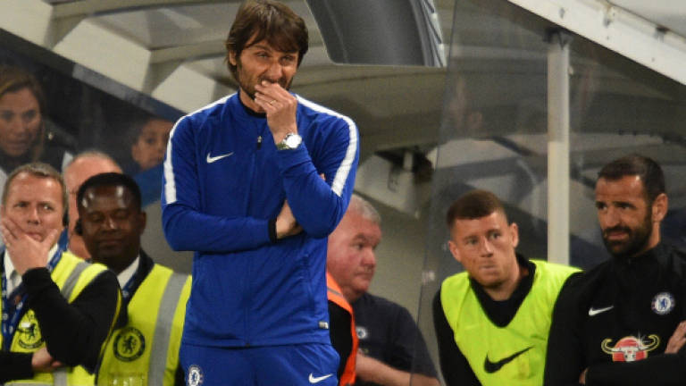Chelsea's top four bid suffers blow as Huddersfield survive