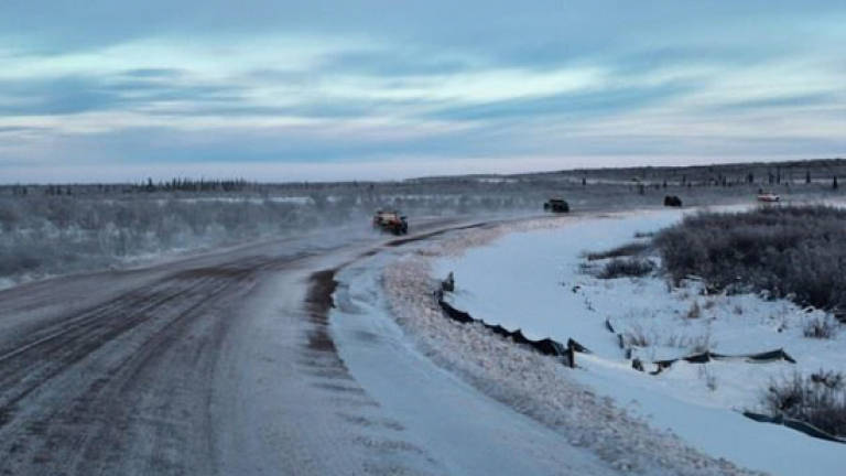 Canada highway throws lifeline to Arctic hamlet