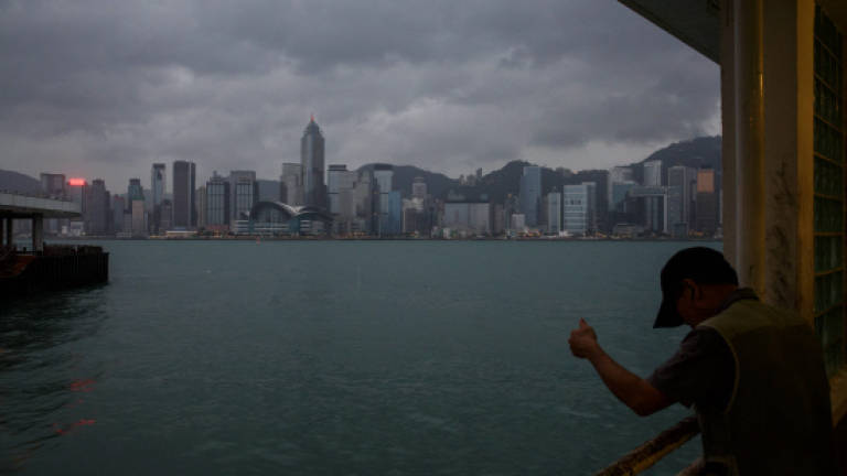 Hong Kong in lockdown as Typhoon Haima nears (Updated)