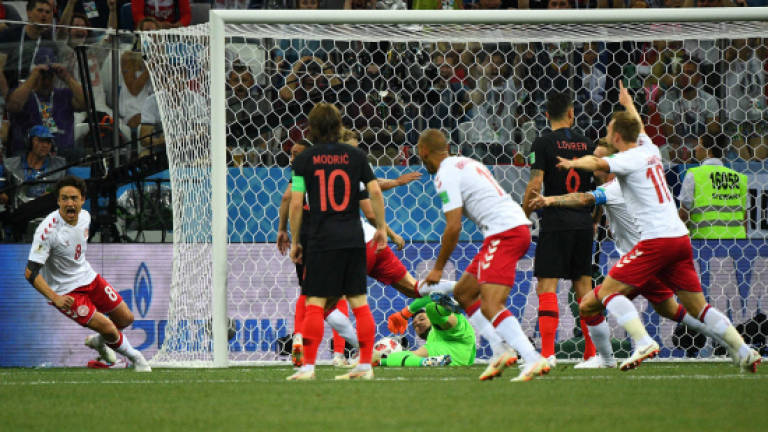 Croatia beat Denmark on penalties to make World Cup quarter-finals Croatia beat Denmark on penalties to make World Cup quarter-finals