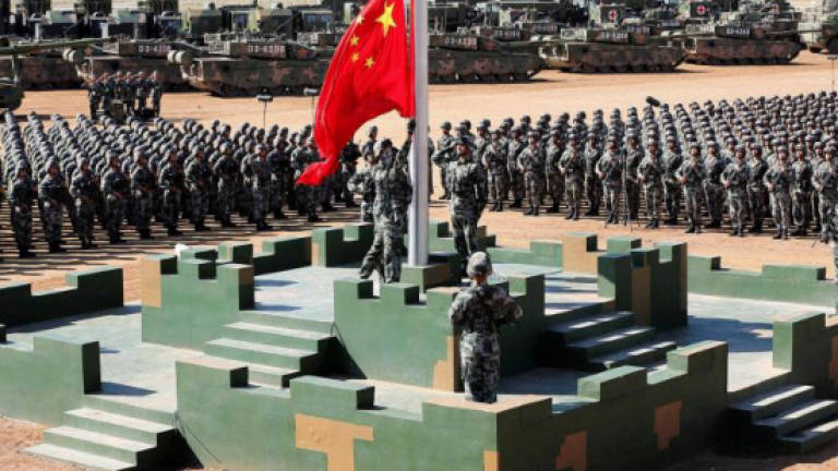 China to raise defence budget by 8.1% in 2018