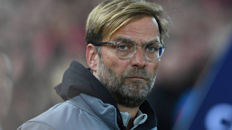 Klopp at peace after stormy Sevilla conclusion