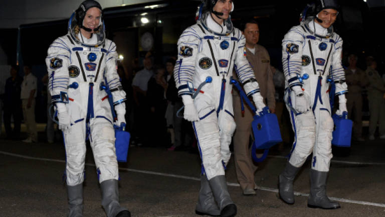 Three astronauts blast off for ISS in upgraded Soyuz craft