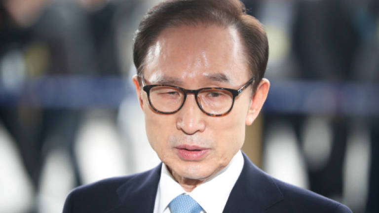 Arrest warrant issued for ex-South Korean President Lee: Yonhap