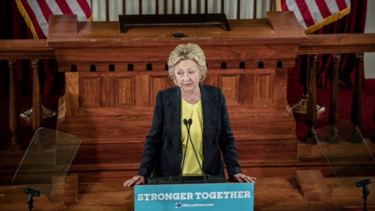 Clinton says Trump corrupts party of abolitionist Lincoln
