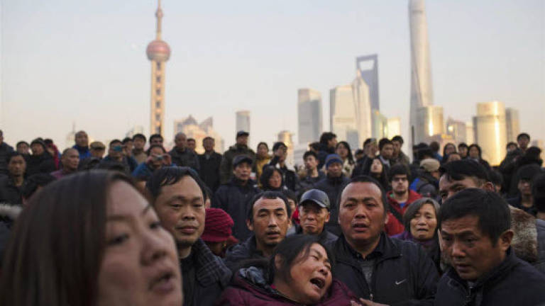 Shanghai cancels lantern festival after stampede