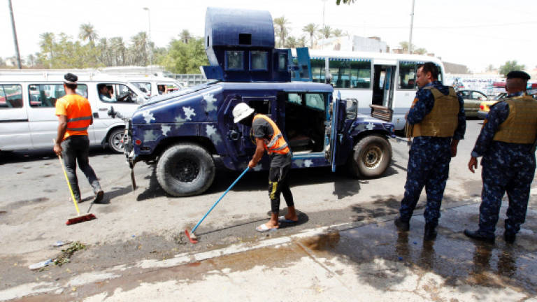IS suicide bomber kills at least 15 in Baghdad