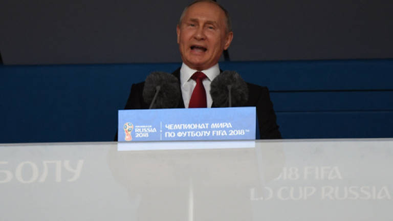 Russia thrash Saudi Arabia to launch World Cup in style