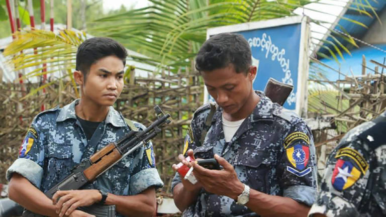 Fear grips western Myanmar as troops pour in