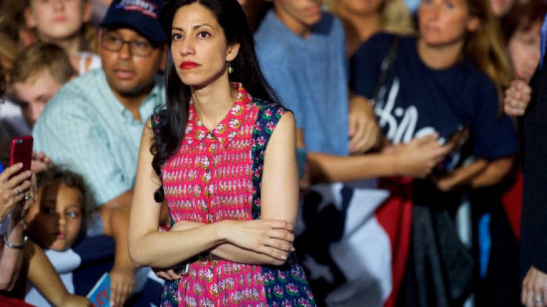 Clinton aide Abedin leaves husband after new 'sexting' revelations
