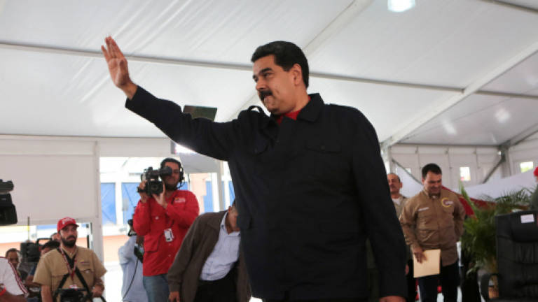 Venezuela's Maduro lashes out at 'insolent' US sanctions