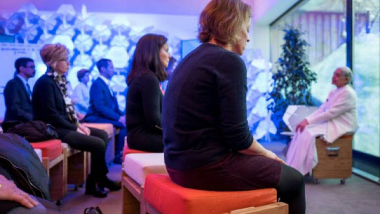 In Davos, firms meditate on quest for mental wellbeing