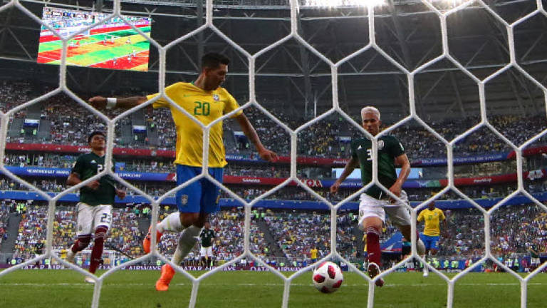 Neymar leads Brazil into quarter-finals with 2-0 win over Mexico