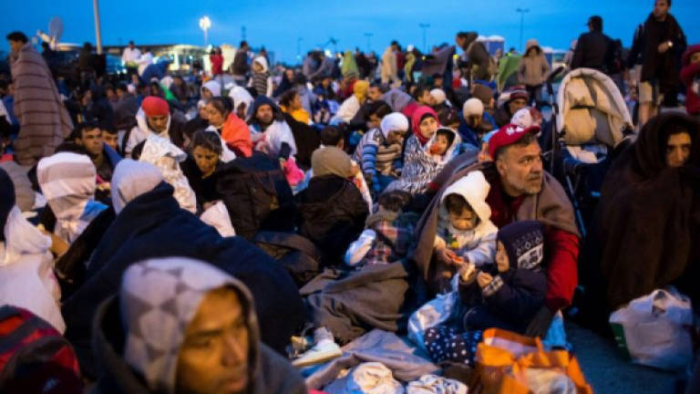 EU takes Czechs, Hungary, Poland to top court over refugee quotas