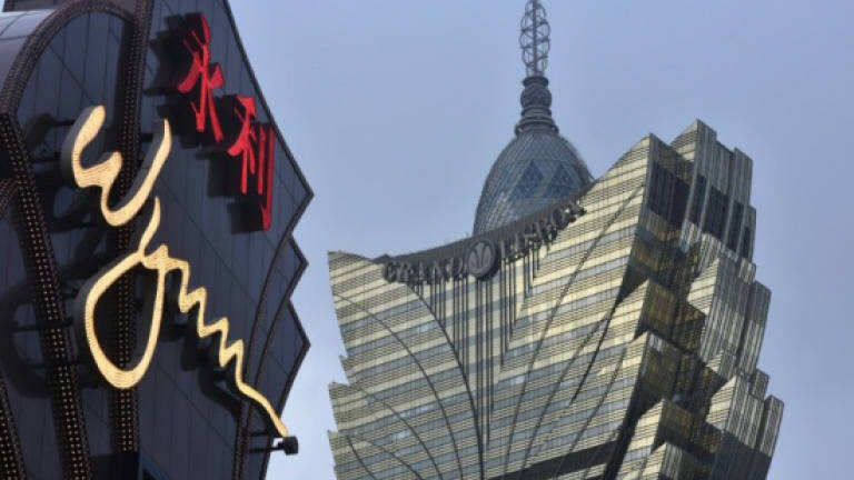 Croupier and guard arrested over US$6m Macau casino heist