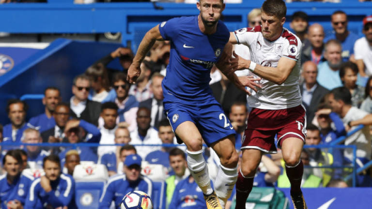 Burnley stun nine-man Chelsea, Aguero downs Brighton