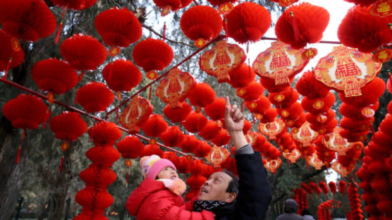 Travel peak comes as Chinese go home for Spring Festival