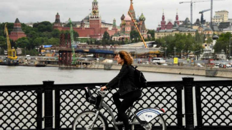 Pedal power sways Muscovites despite perils
