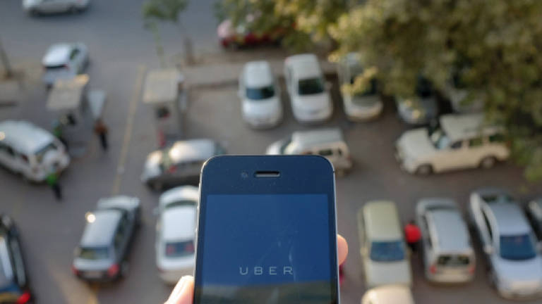 Uber suspends operations in Delhi after alleged rape