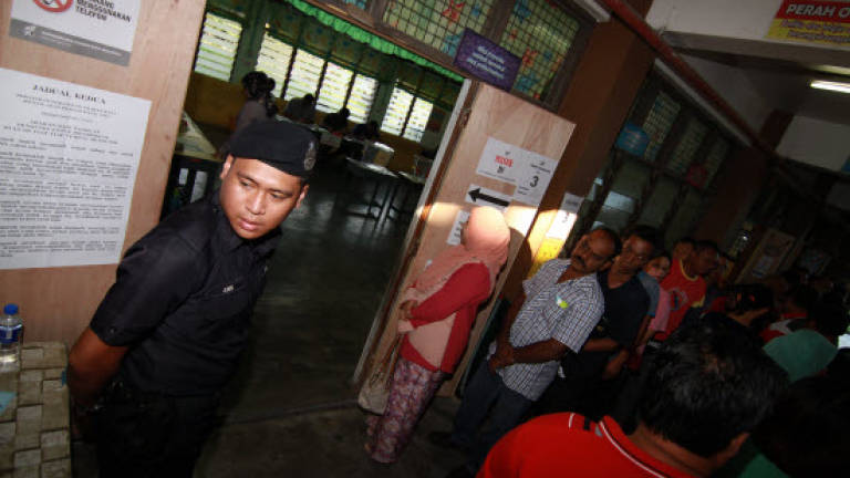 Six held over alleged assault of two men at Johor polling centre