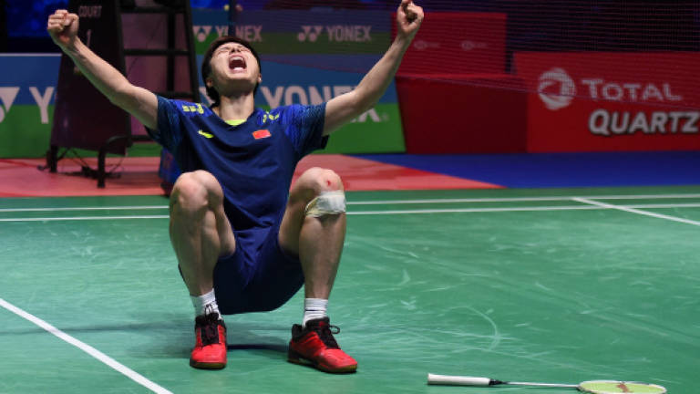 Lin Dan stunned by Shi in All England Open final