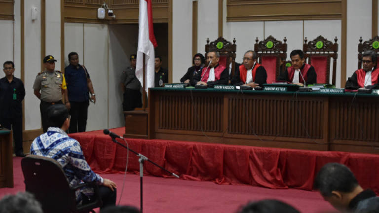 Jakarta's Christian governor jailed for two years for blasphemy