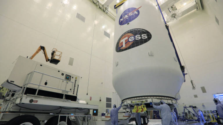 SpaceX blasts off Nasa's new planet-hunter, TESS