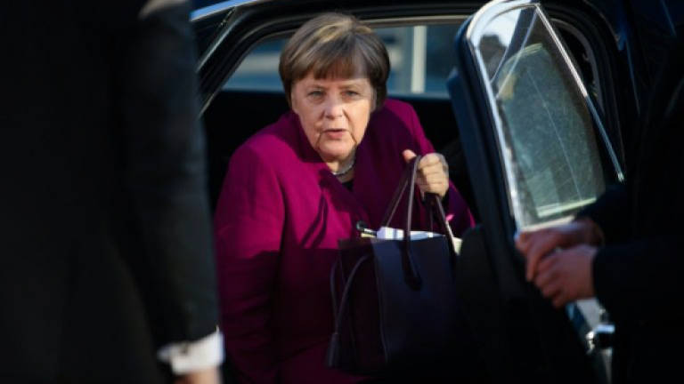 Germany's top parties reach deal on Merkel coalition